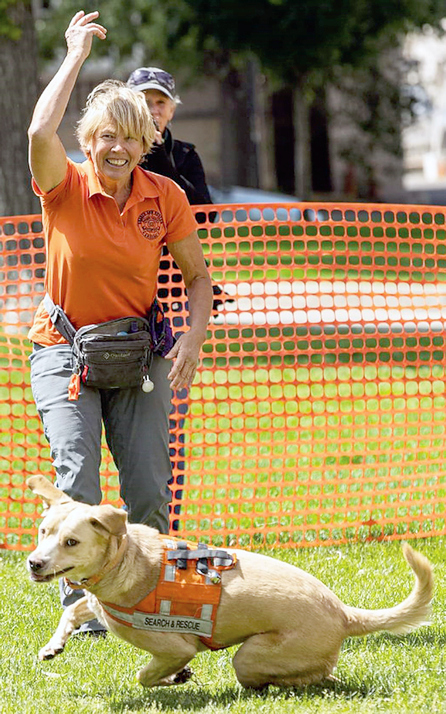 Handler Ann Schmidt and her air scent dog