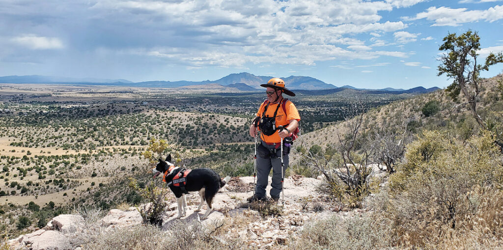 Handler Blair Burtan with his air scent dog